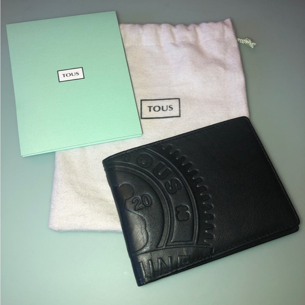 Tous men's leather wallet NEW